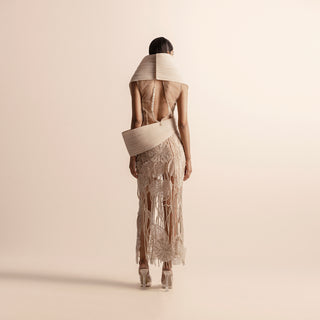 Back view of sculpted pleated top and 3D embellished skirt set – sculpted top back, 3D embellished skirt, futuristic fashion,, 