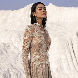 Close-up of long jacket with Nadru-inspired 3D embellishments – designer fusion outerwear detail,designer outerwear, fusion fashion, embellished jacket