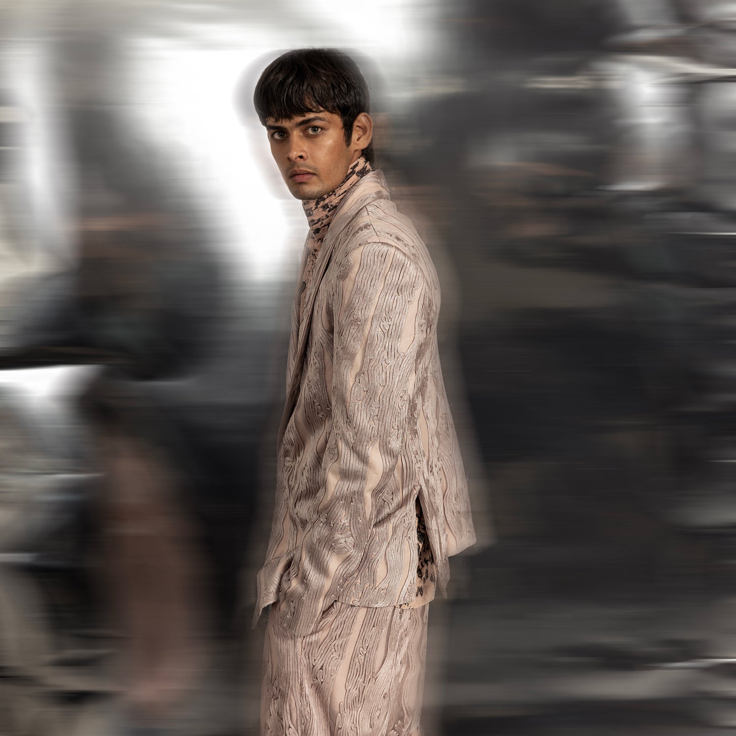 Shawl collar jacket embellished with graphic yarn couching in a linear pattern. The jacket is paired with matching wide hem yarn couching detailed trousers. A high-collar shirt in reef print makes a perfect ensemble for special occasions.  #abhisheksharma #fashiondesignerabhisheksharma #reef #redcarpet #shortdress #abhishekstudio #lfw #fdci 