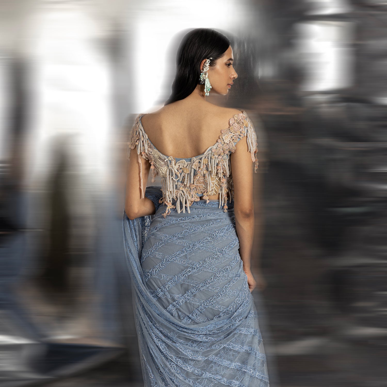Net saree embellished with fine Resham and beadwork in linear design. The 3D embellished blouse imparts an elegant blend of modernity and tradition.  #abhisheksharma #fashiondesignerabhisheksharma #reef #redcarpet #shortdress #abhishekstudio 