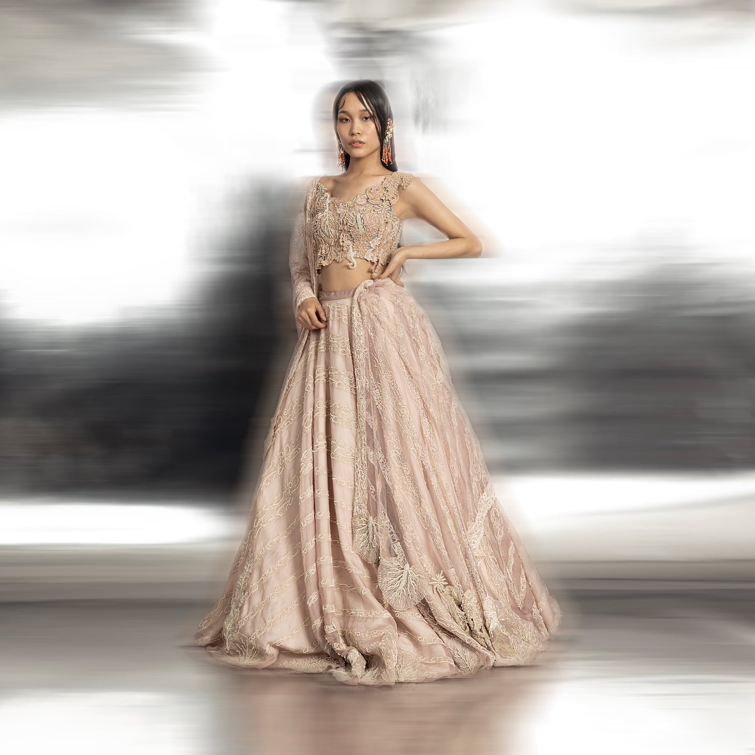 Silk Organza Lehenga with a fine play of geometric lines and reef Motifs with 3D Embroidery detailing on the Blouse. There is a fine play of Resham, Sequin, Pearl, and Katdana detailing. The look has playful young vibes that are perfect for someone who loves new and different visions of design.  #abhisheksharma #fashiondesignerabhisheksharma #reef #redcarpet #shortdress #abhishekstudio #lfw #fdci 