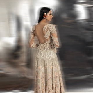 3D embellished multi panneled flared jacket emitating the harmonious under water eco system of coral reef. The look is perfect for someone who has great eye to detail and loves fine craftsmanship. The jacket is teamed up with high waisted quilted trouser. #abhisheksharma #fashiondesignerabhisheksharma #reef #redcarpet #shortdress #abhishekstudio #lfw #fdci 
