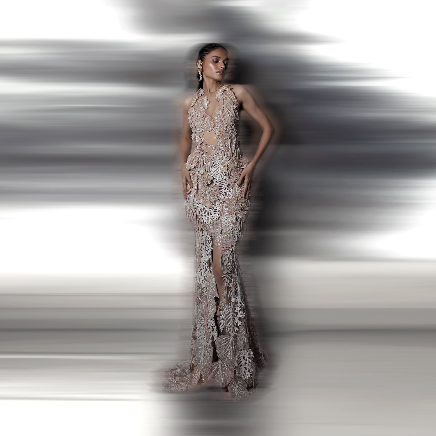3d embroidered sequins gown inspired by the calony of coral reef and the play of sunlight falling on the ocean floor teamed with can-can skirt. The look is a perfect proposition of elegance and style, classic and modern. #abhisheksharma #fashiondesignerabhisheksharma #reef #redcarpet #shortdress #abhishekstudio #lfw #fdci 