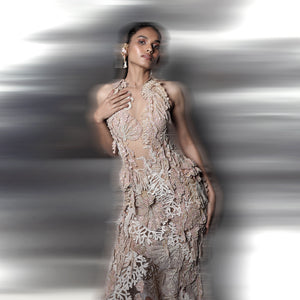 3d embroidered sequins gown inspired by the calony of coral reef and the play of sunlight falling on the ocean floor teamed with can-can skirt. The look is a perfect proposition of elegance and style, classic and modern. #abhisheksharma #fashiondesignerabhisheksharma #reef #redcarpet #shortdress #abhishekstudio #lfw #fdci 
