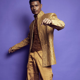 Man in gold textured Bandhgala suit with metallic shirt and matching trousers - Tuxedo, retro suit, menswear