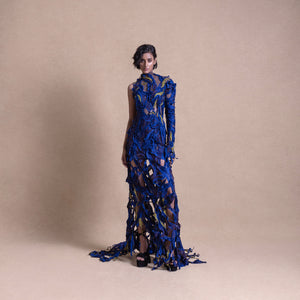 asymmetrical blue gown featuring sheer fabric, textured embroidery, and bold cutouts - asymmetrical gown, red carpet look, cocktail gown