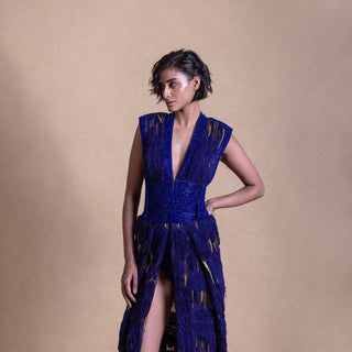 Close-up of deep V-neck royal blue couture gown with textured fringe and beaded detailing – luxury evening fashion, red carpet look, deep V-neck evening dress