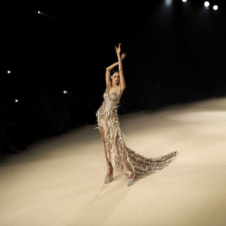 Structured corset with 3D embellished trail skirt – futuristic couture ensemble. redcarpet cocktail gown