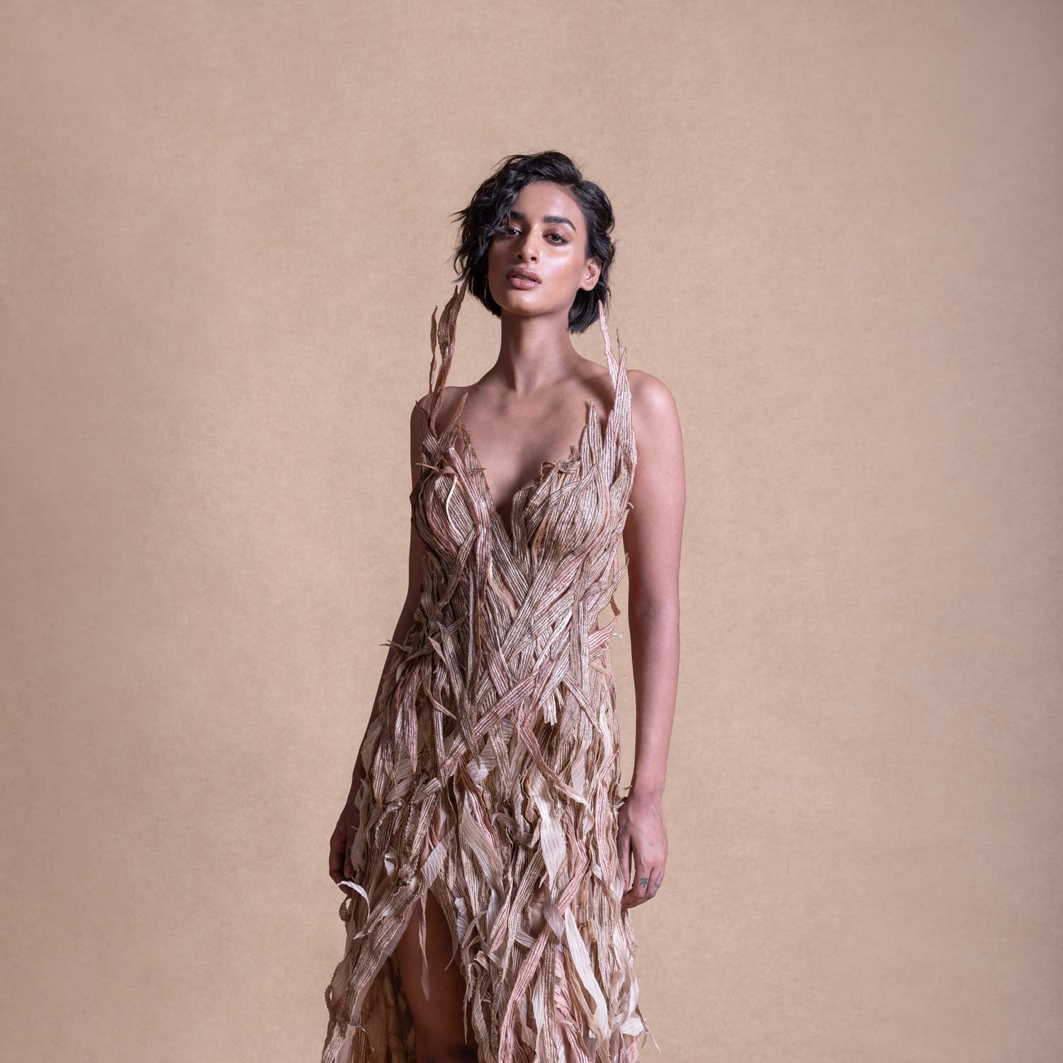 Structured corset gown with 3D trail details on studio model - couture gown, 3D fringe dress, redcarpet cocktail gown