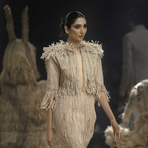 Cropped jacket set with power shoulders and textured skirt – edgy luxury fashion runway style