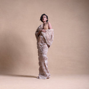 backless gown with string design and textured  cape – stylish fashion portrait, high fashion