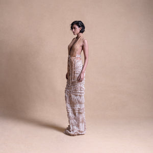 Backless dress with drip string design and side cutouts – contemporary fashion portrait, high fashion
