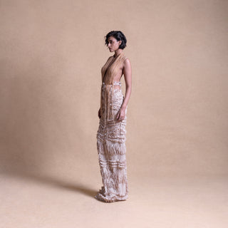 Backless dress with drip string design and side cutouts – contemporary fashion portrait, high fashion