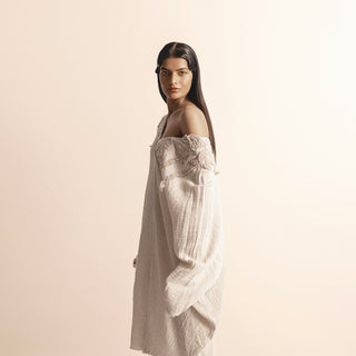 side view of Women's off-shoulder crinkled tunic with tonal embroidered motifs – soft artisanal elegance in profile view