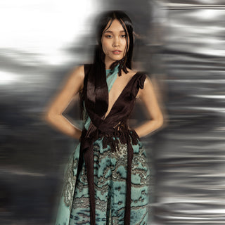 upperbody view of Women's draped raised neck jumpsuit with structured bodice and reef printed wide-leg trousers – artistic silhouette with placement embroidery