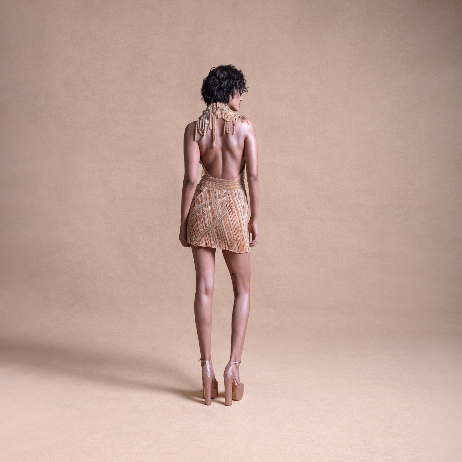 back view of Backless Short Dress with Drip String Accents – Trendy Party Wear, Bold Cocktail Design