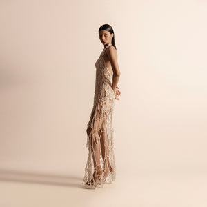 Side view of women's halter neck corded evening dress with cascading string embellishments –  halter neck gown, eveningwear, sculptural design, 