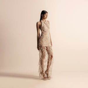 Side view of halter neck drip string gown with sculpted fit and sheer paneling – avant-garde, drip string gown, halter neck dress, designer eveningwear
