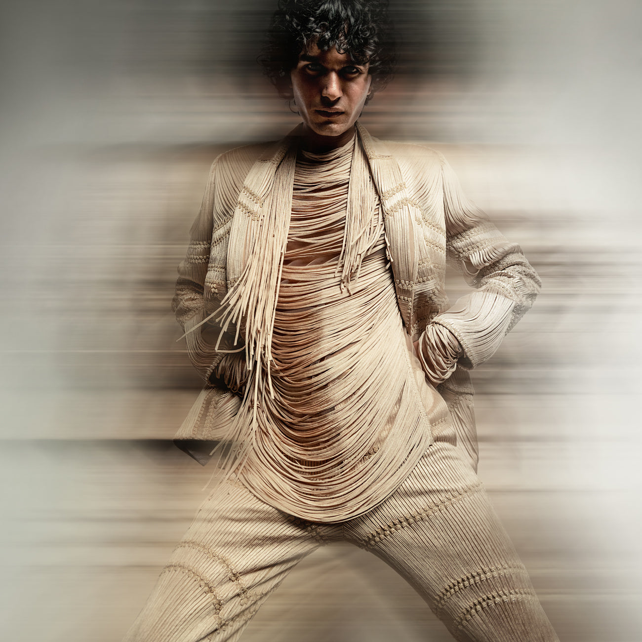 upperbody view of Men's sculpted yarn layered co-ord set with textured one-button jacket – modern cocktail suit in neutral tones