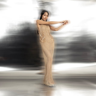full front view of pleated high-neck shift gown with side drape and subtle embroidery – sleek contemporary evening silhouette