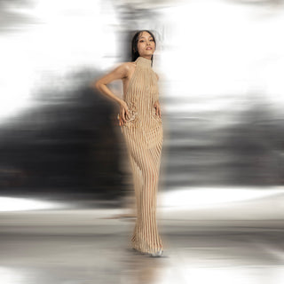 full length of Women's incut sleeve gown with high collar and vertical pleated texture – sleek modern silhouette for evening wear