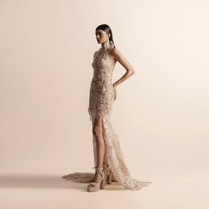Side view of high halter neck embellished gown with high slit and trail – showstopper evening wear, reception gown, formal side view