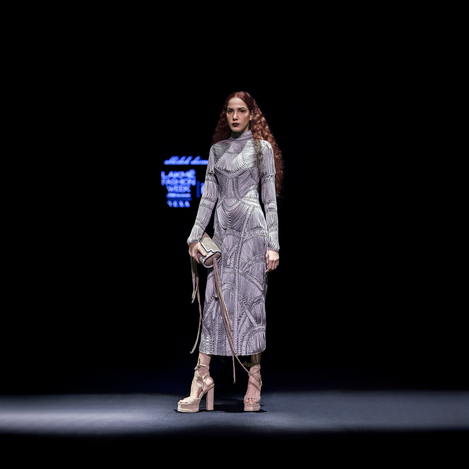 Women's full-sleeve high-neck midi dress with sculpted yarn texture – stylish youngster party look on the runway