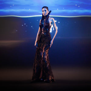 Women's high neck halter gown with reef-inspired cutwork and sculpted sheer panels – elegant couture for red carpet or receptions