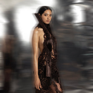 side close-up of Women's side-profile reef halter gown with sculpted collar and lace embroidery – couture cocktail dress for red carpet events