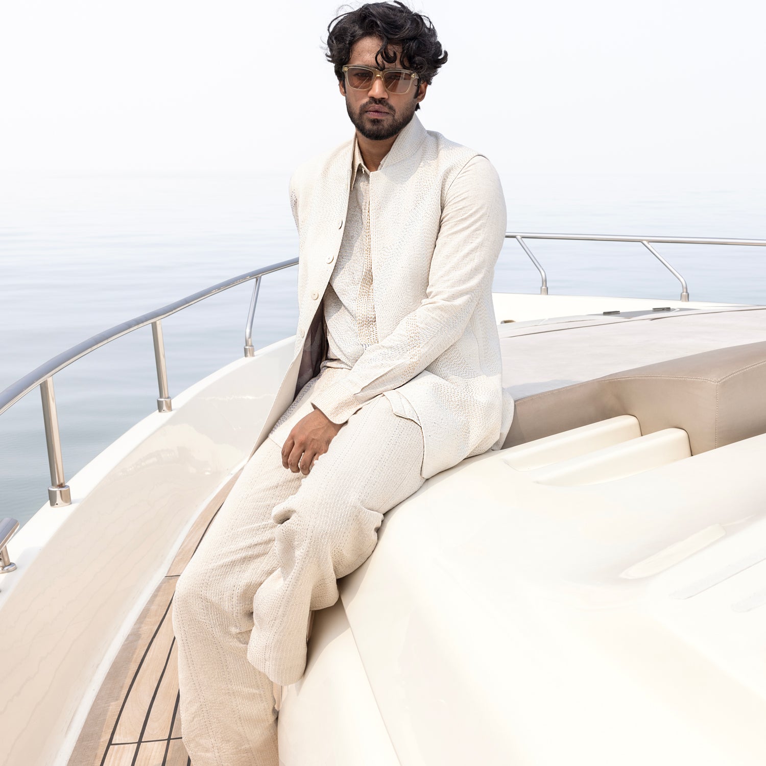 Men's ivory Kantha embroidered sleeveless Bundi jacket, shirt, and matching trousers – refined resort and wedding ensemble, Classic preppy summer look for men