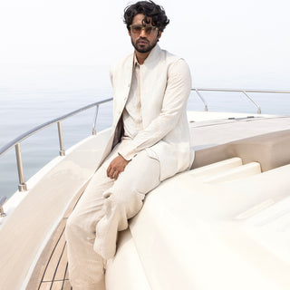 Men's ivory Kantha embroidered sleeveless Bundi jacket, shirt, and matching trousers – refined resort and wedding ensemble, Classic preppy summer look for men