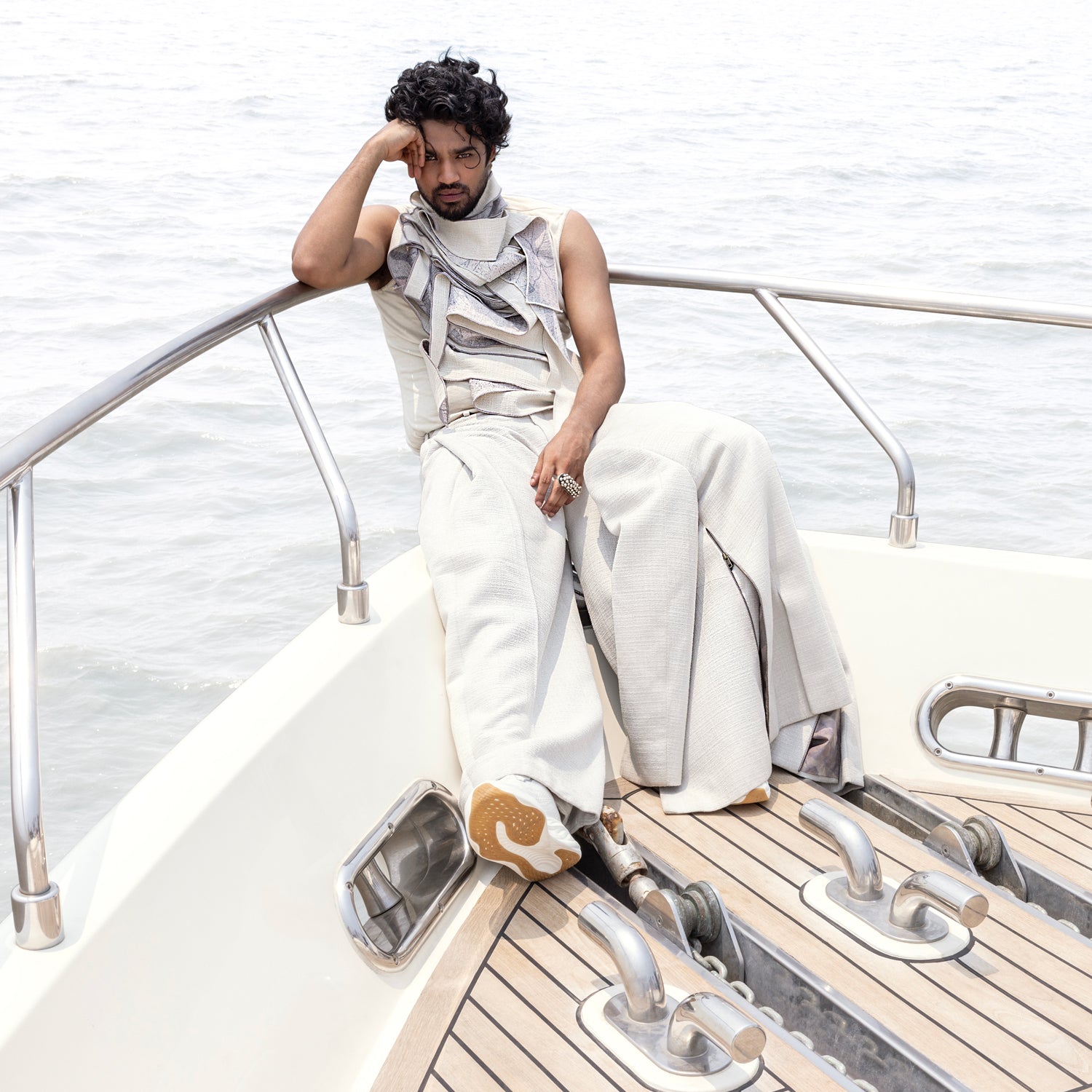 Ivory bandhgala set with layered inner tee and relaxed pleated pants – modern festive outfit with structured ease