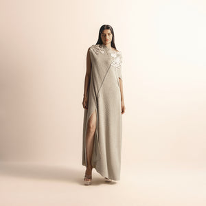 full length of Women's asymmetrical knit gown with floral yarn detailing and thigh-high slit –  asymmetrical knit gown, floral yarn detailing, thigh slit dress, evening knitwear,