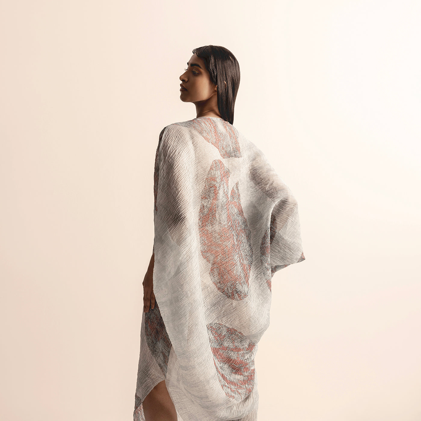 backside view of Women's Nadru graphic printed kaftan with flowing asymmetric hem and textured sheer fabric - sheer fabric, Nadru print, lightweight drape