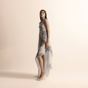 Women's sleeveless asymmetrical Nadru dress in graphic print with heat textured drape and flowy hem, asymmetrical dress