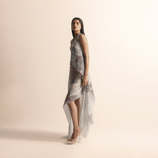 Women's sleeveless asymmetrical Nadru dress in graphic print with heat textured drape and flowy hem, asymmetrical dress