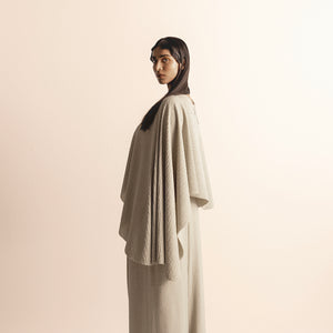 Women's ivory knit cape-style crop top with soft drape and wide-leg quilted pants–  cape-style crop top, quilted wide-leg pants, ivory knit set, Indo-western fusion,