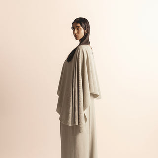 Women's ivory knit cape-style crop top with soft drape and wide-leg quilted pants–  cape-style crop top, quilted wide-leg pants, ivory knit set, Indo-western fusion,