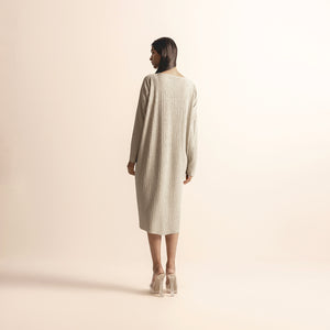 back view of Women's  knit dress with full-length sleeves and clean back silhouette – minimalist handcrafted look, minimalist design, full sleeves, handcrafted knitwear, neutral tone