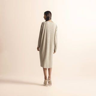 back view of Women's  knit dress with full-length sleeves and clean back silhouette – minimalist handcrafted look, minimalist design, full sleeves, handcrafted knitwear, neutral tone