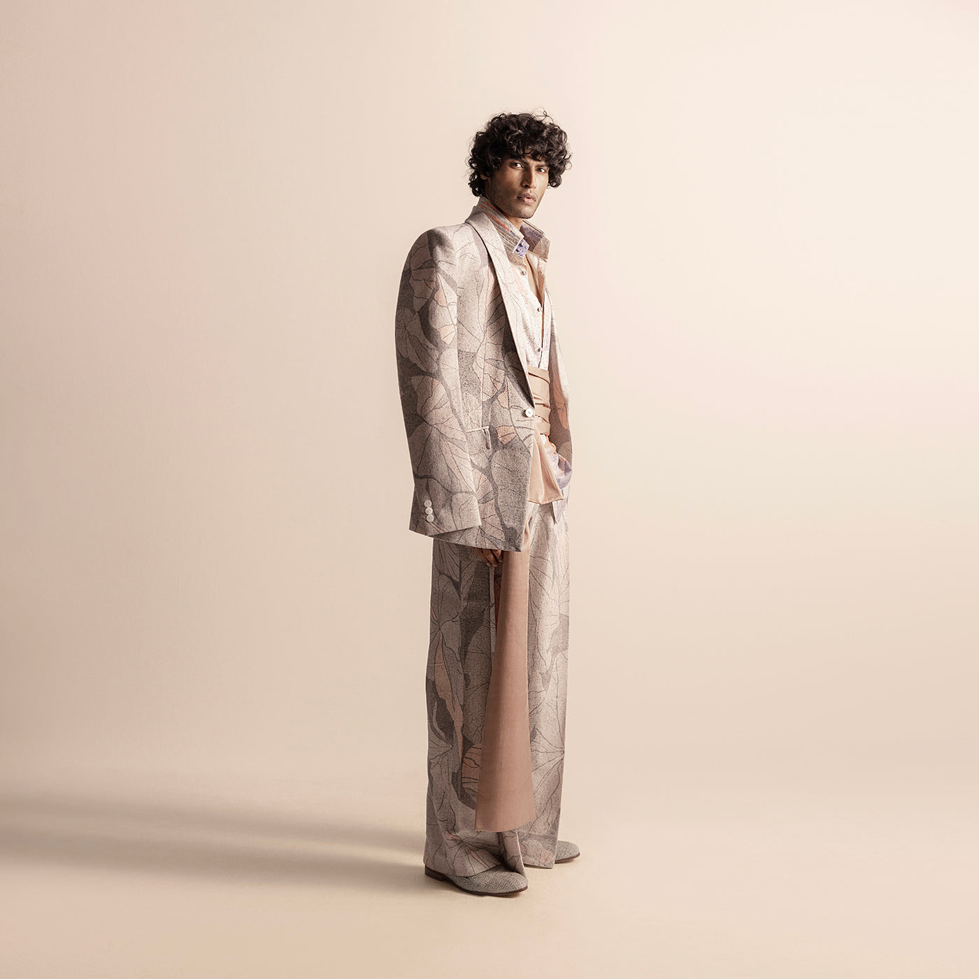 Side view of Nadru printed men's suit with soft sash and structured blazer - structured blazer, fashion sash, artistic suit