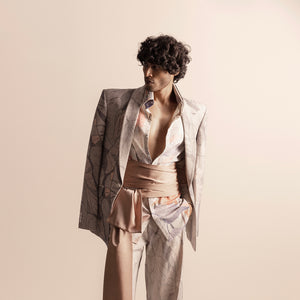Nadru printed suit with draped blazer and soft pink sash – modern artistic menswear, men's fashion sash, artistic print, bold menswear style