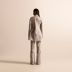 Back view of Nadru printed pant suit with jacket and pants –  printed jacket back, printed pants, designer womenswear, bold fashion, statement suit back, ethnic print suit