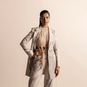 Front side view of Nadru printed pant suit with jacket and top –  printed jacket, printed pants, designer womenswear, bold fashion, statement suit