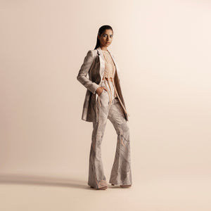 profile view of Nadru printed pant suit with jacket and flared pants –  printed jacket, flared pants, bold fashion, designer pant suit