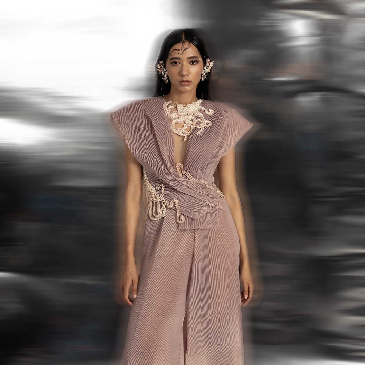 upperbody view of Women's pleated blush organza top with sculpted shoulder and embroidered neckline – couture jumpsuit set