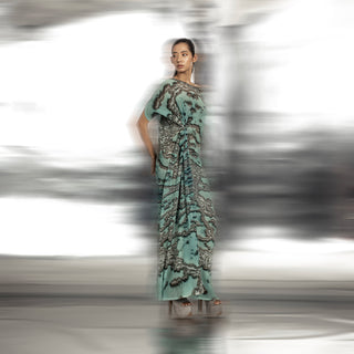 full body view of Women's reef printed drop-shoulder gown with pleated gathering and side slit – contemporary ocean-inspired couture