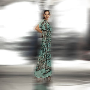 side view of Women's reef print gathered drape gown with drop-shoulder sleeves and side pleats – fluid contemporary couture, reef print gown