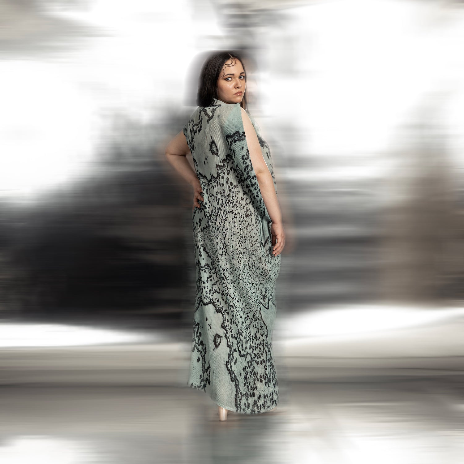 full back view of Women's coral reef textured gown with slit sleeve – luxe eveningwear in oceanic tones