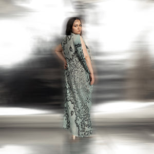 full back view of Women's coral reef textured gown with slit sleeve – luxe eveningwear in oceanic tones